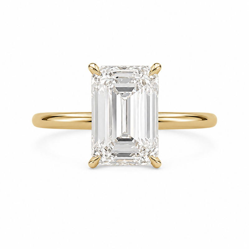 The Art Deco — Emerald Hidden Halo Ring