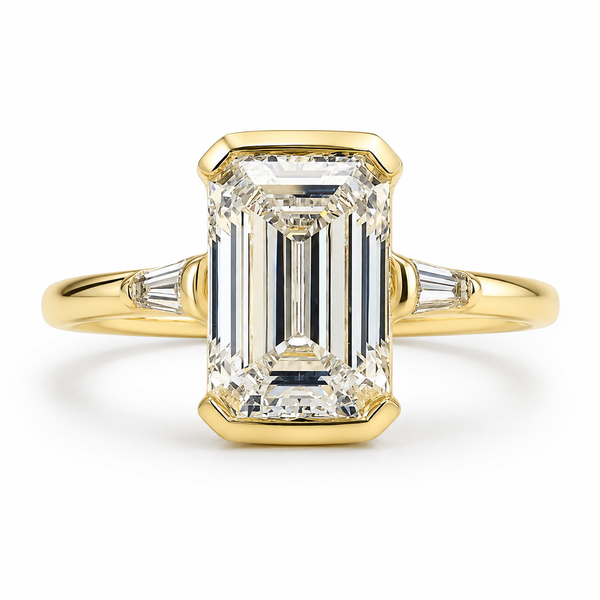 The Trieste — Emerald Bezel Three Stone Ring