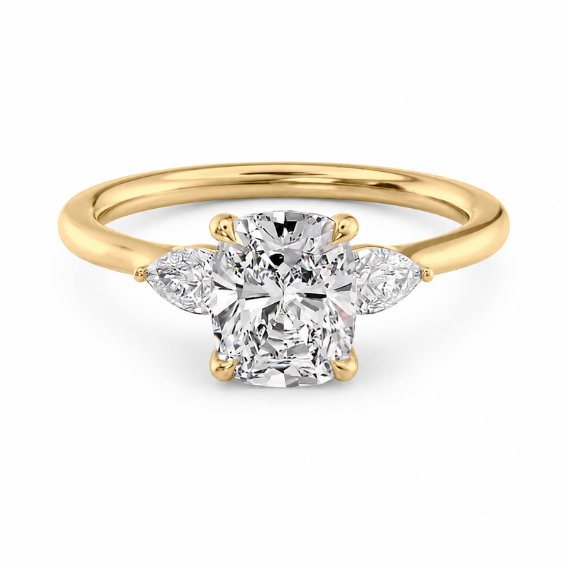 The Trilogy — Elongated Cushion Three Stone Ring