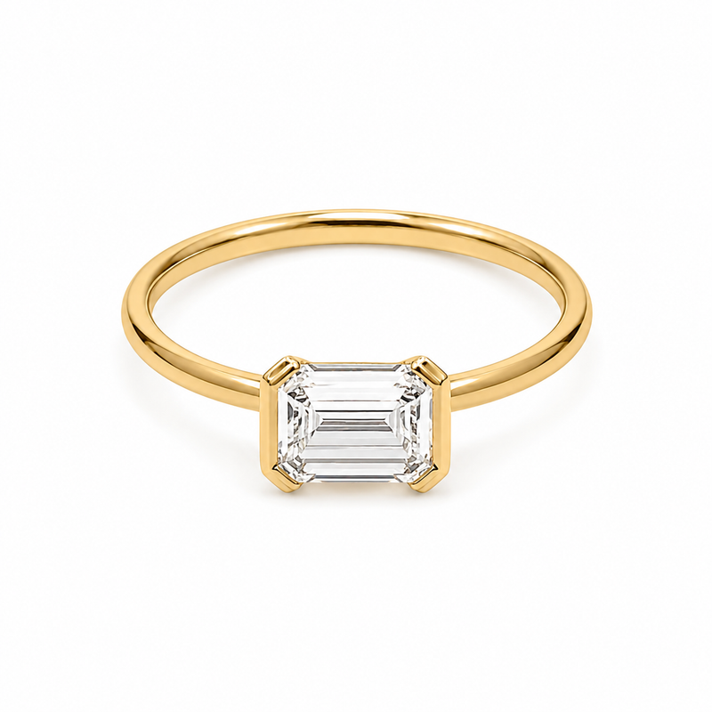 The East West Half Bezel — Emerald Diamond Ring