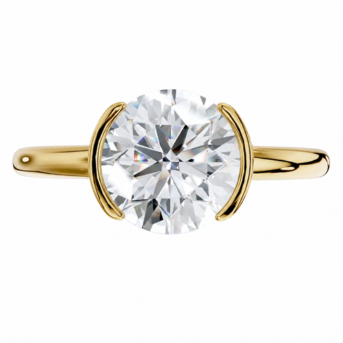 Gold ring with a large diamond on a white background