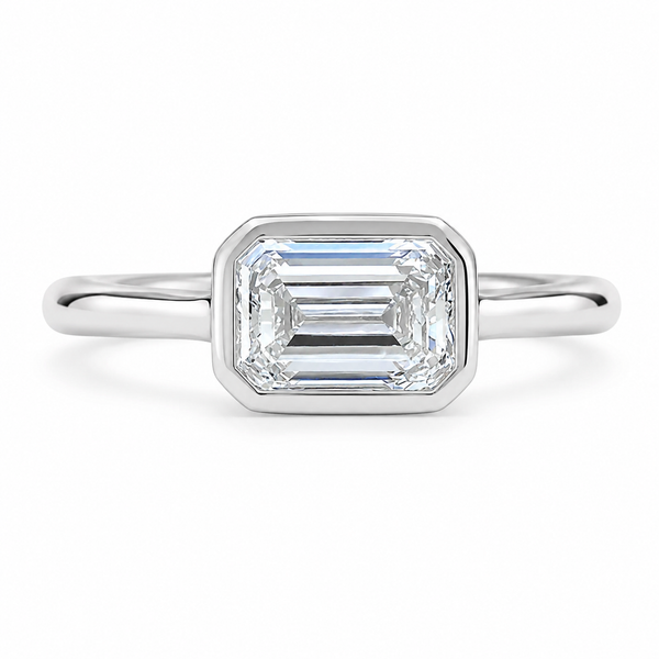 The East West Bezel — Emerald Diamond Ring